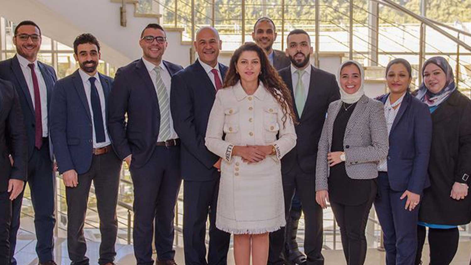 Hanan Nagi, Founder and CEO, Human Network International, with her team